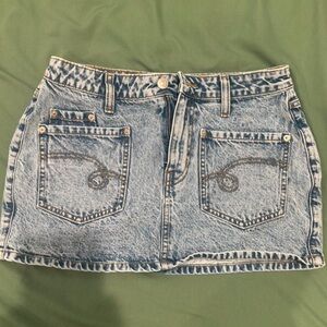 light blue mini skirt 
super cute will fit a size 26/27